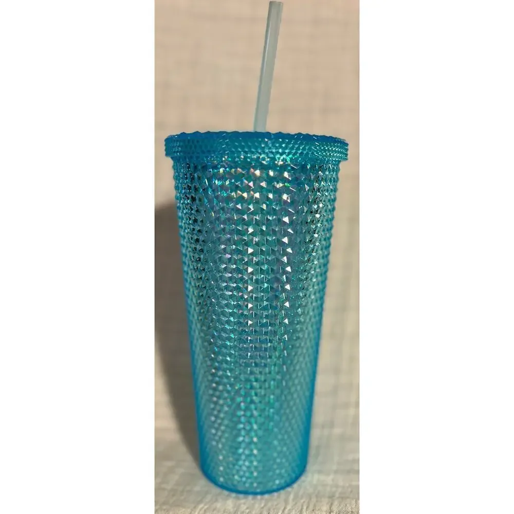 Blue studded drinking cup